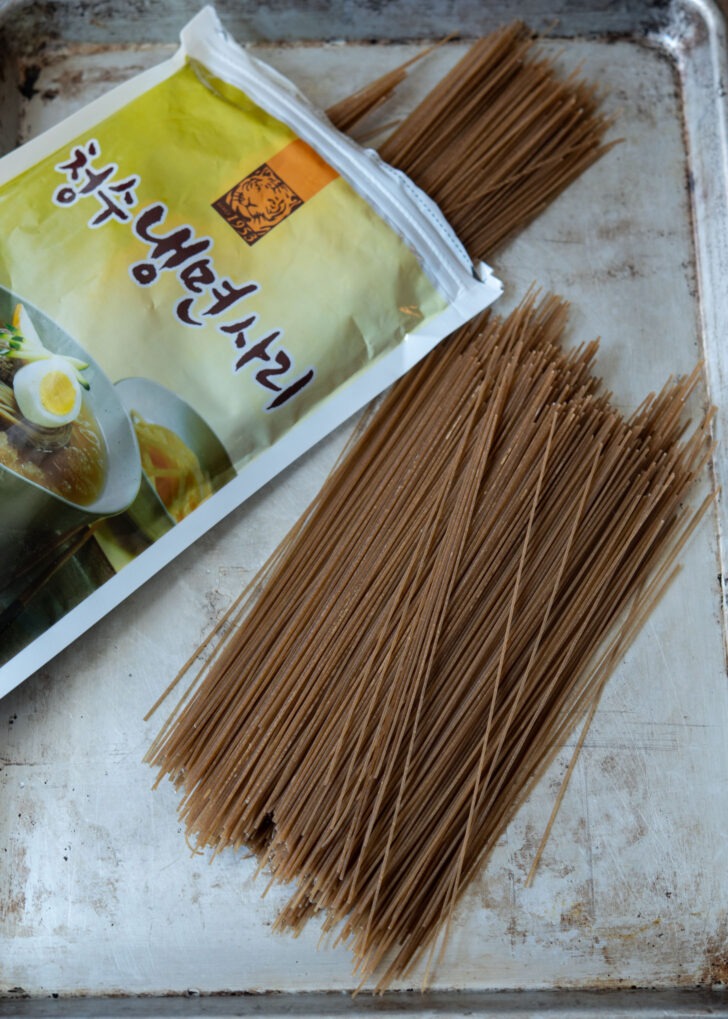 Naengmyeon noodles made with buckwheat and starch are popular noodles in Korean cuisine