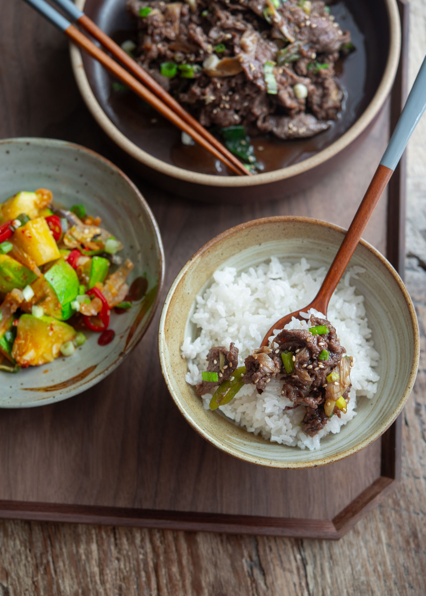 Beef bulgogi served with rice and Korean vegetable side dish.