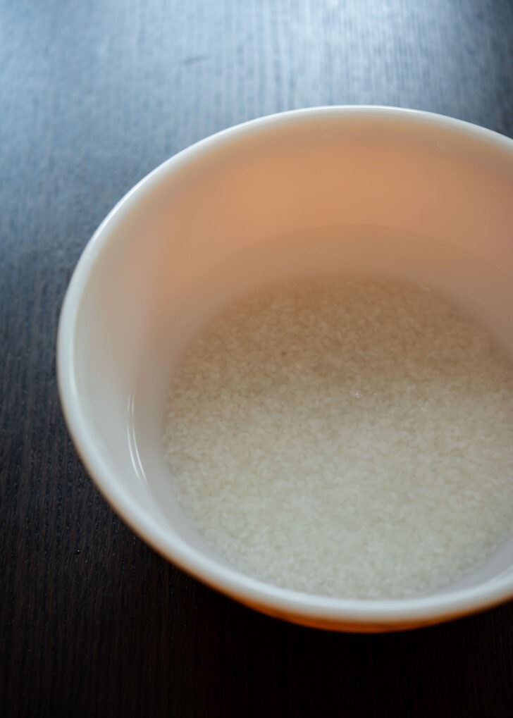 Short grain rice soaking in water 
