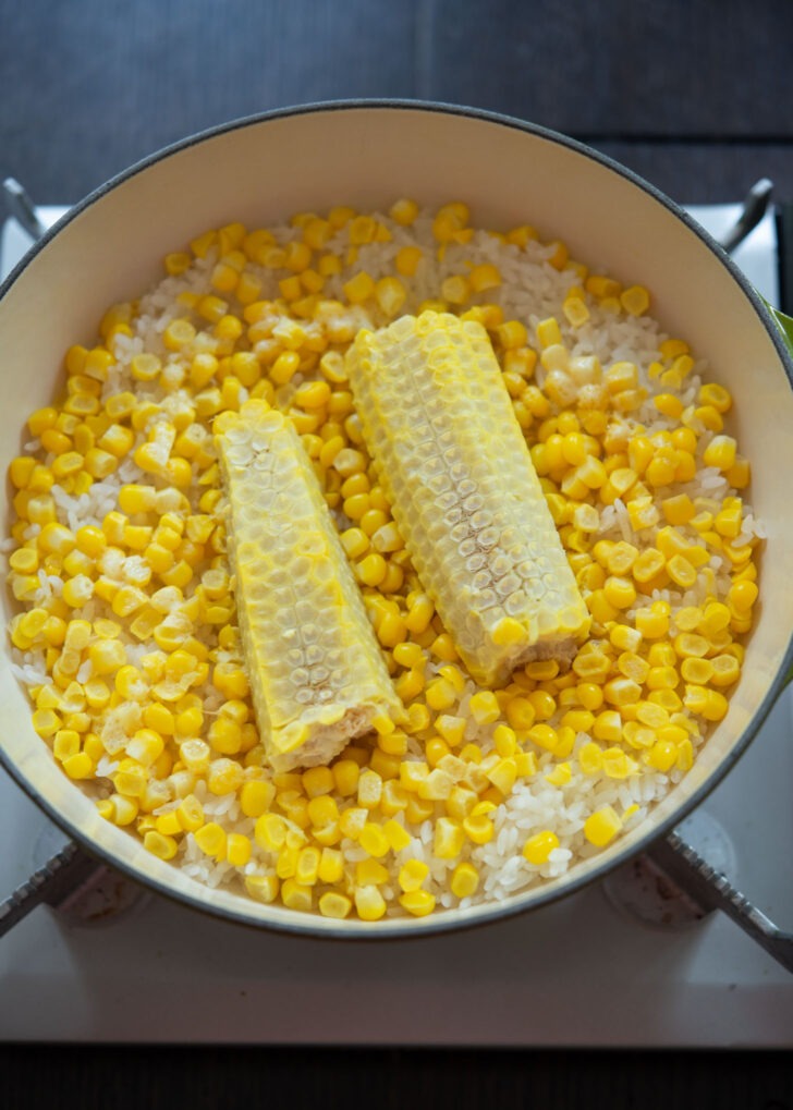 Corn rice cooked in a pot.