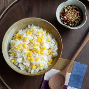 Corn rice served with Korean style topping sauce.
