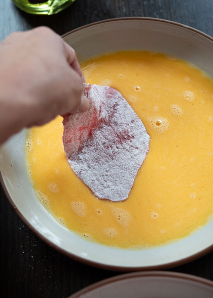 Yukjeon beef slices coated with flour and beaten egg