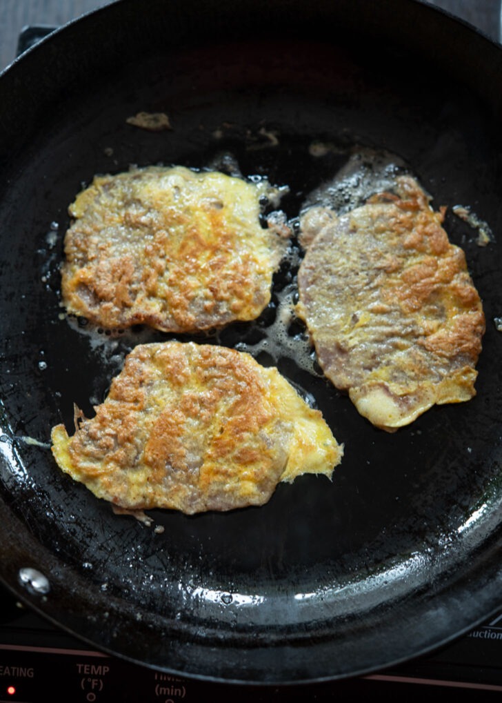 Egg battered Korean beef pancakes pan-fried to light golden.