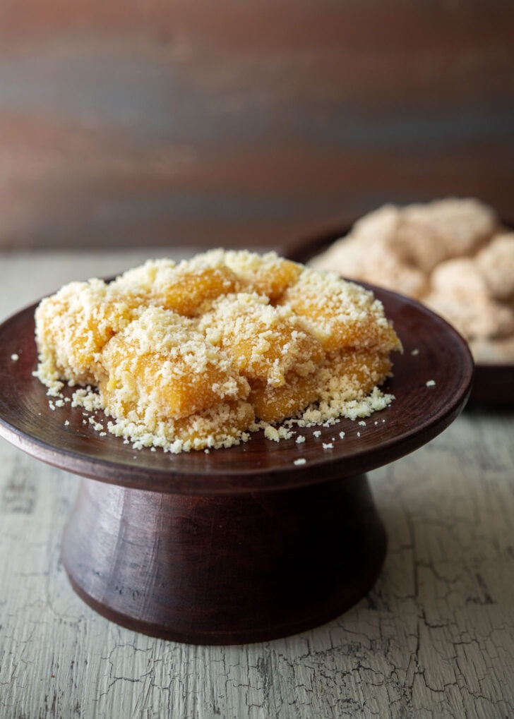 Pumpkin injeolmi pieces coated with castella crumbs.