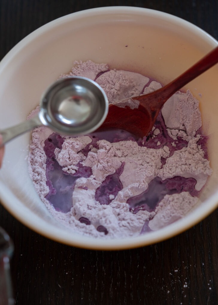Water is added to the Rice flour and purple sweet potato powder mixture.