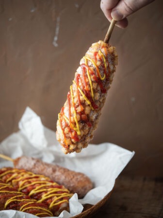 Crispy potato Korean corn dog with sweet and savory condiments