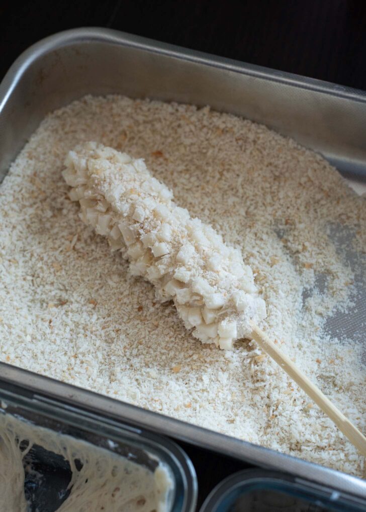 Potato corn dog coating with panko breadcrumbs.