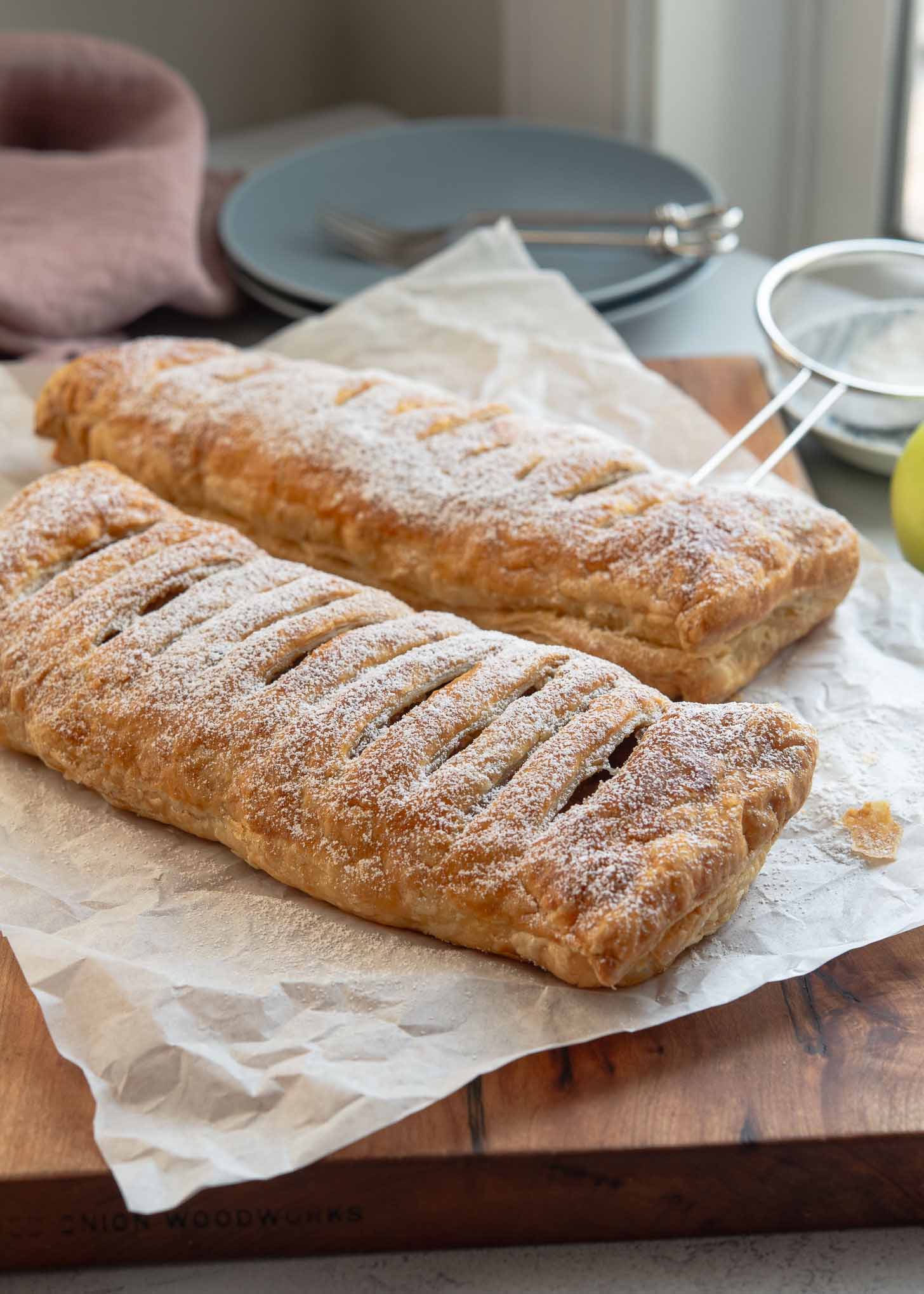 Homemade apple strudel made with puff pastry, golden and flaky
