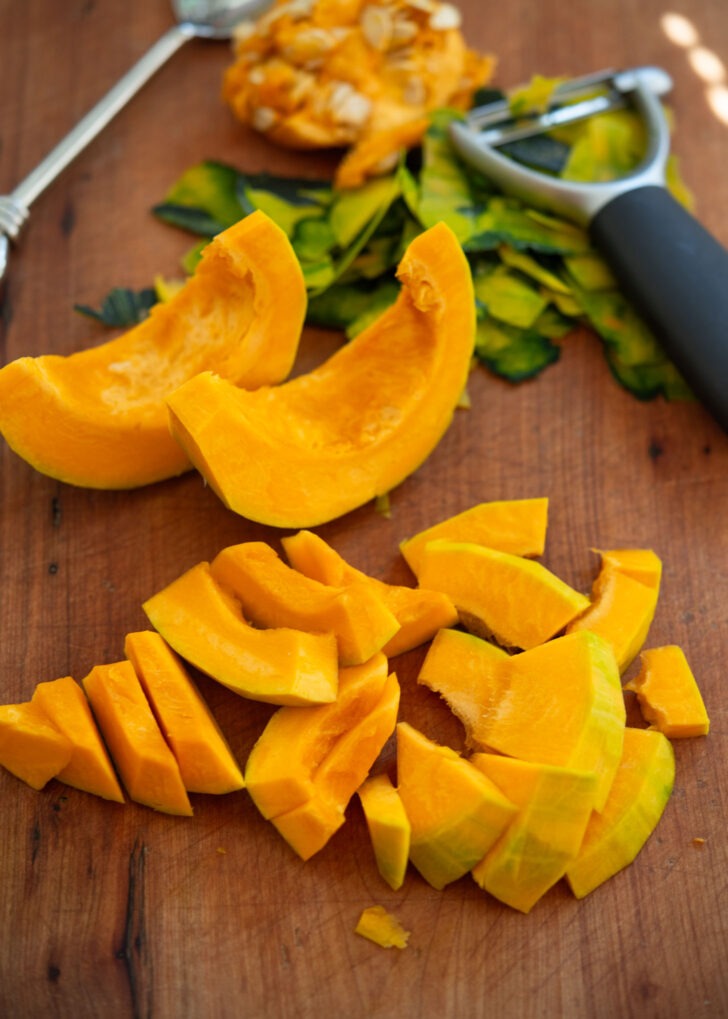 Peeled and seeded kabocha wedges cut into thin slices.