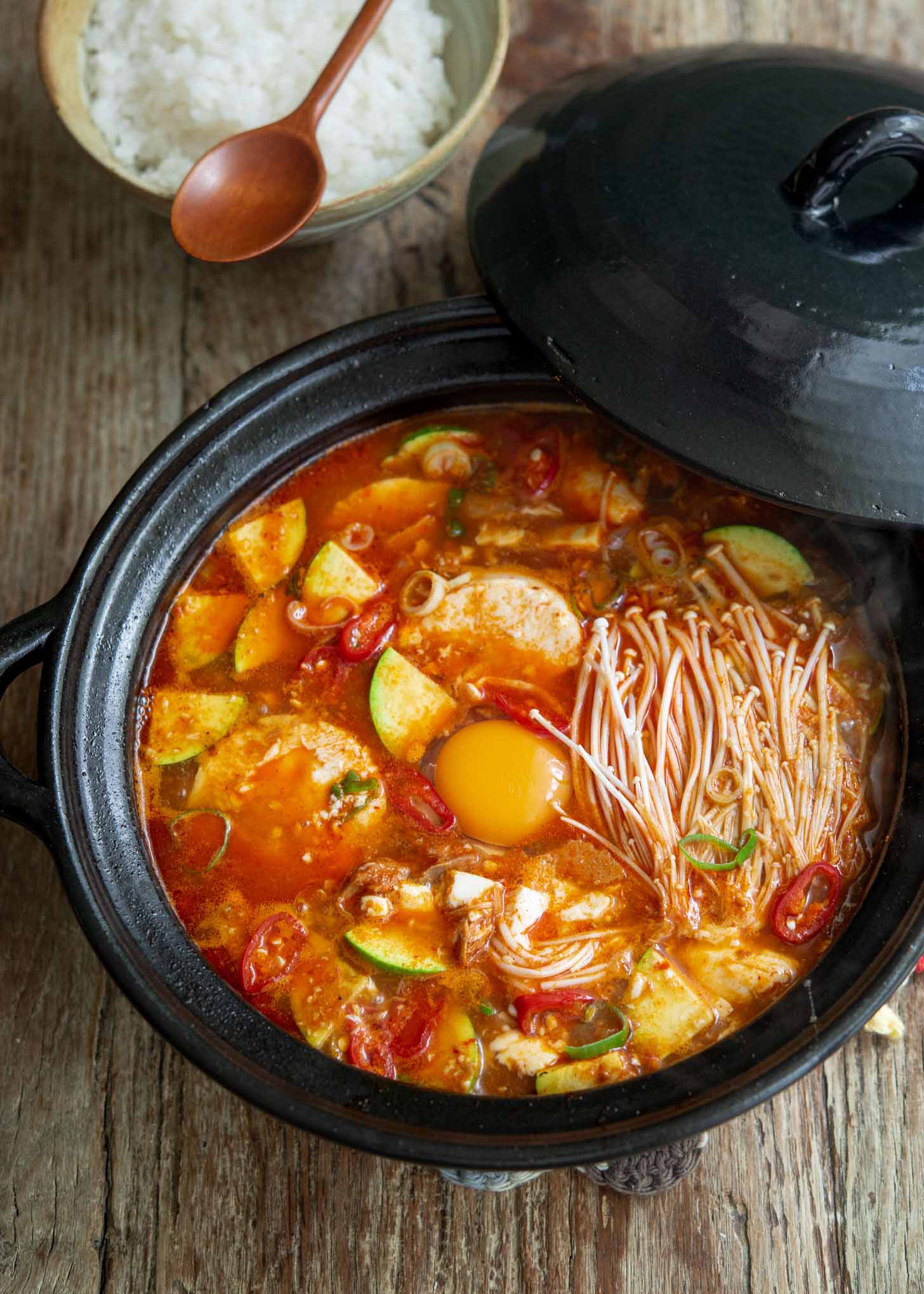 Sundubu jjigae made with canned tuna in a pot.