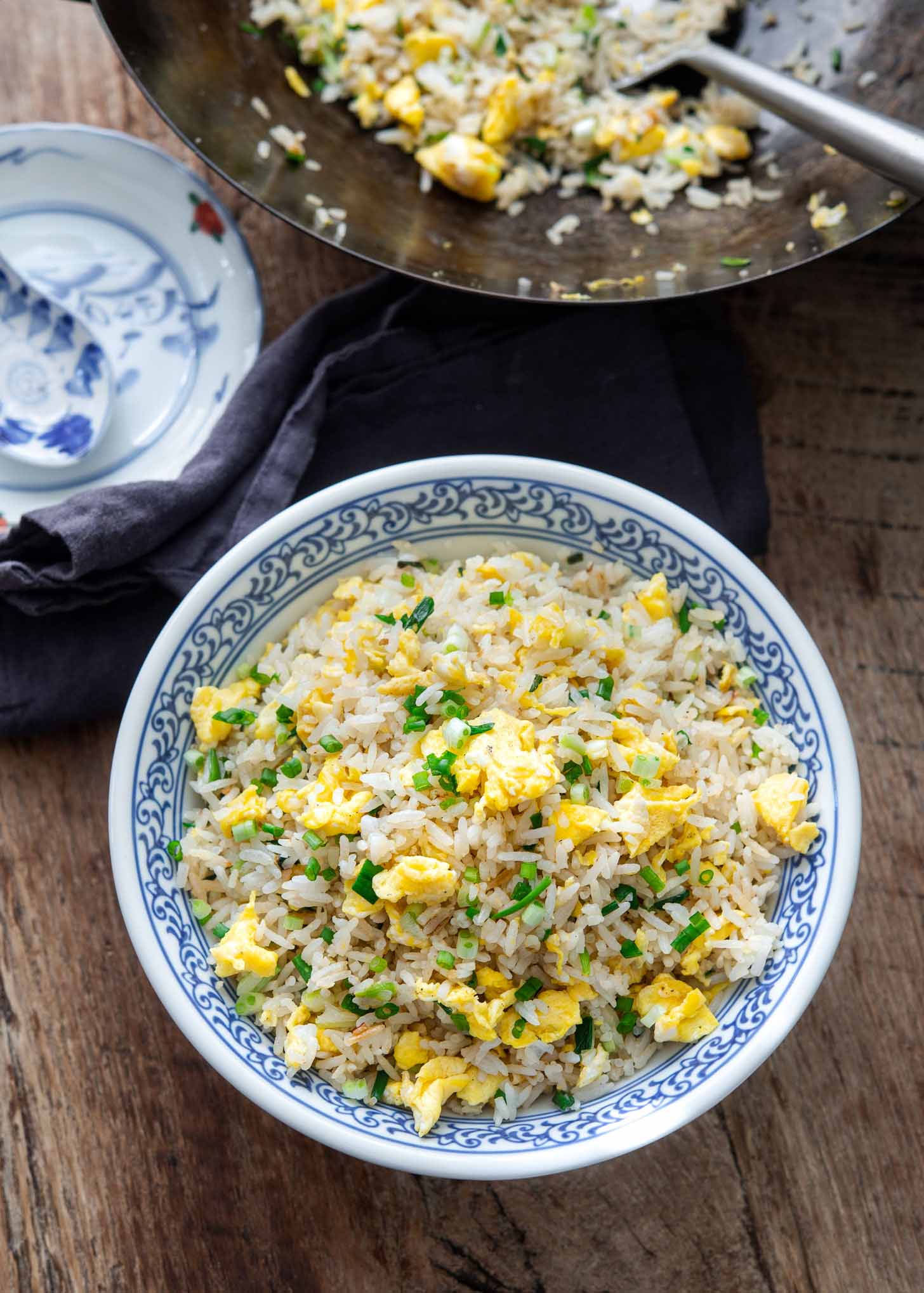 Chinese egg fried rice in a serving bowl.