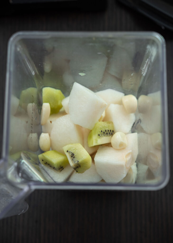 Aromatic vegetables and fruits in a blender.