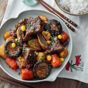 Galbi jjim, Korean braised short ribs, placed in a serving dish with rice.