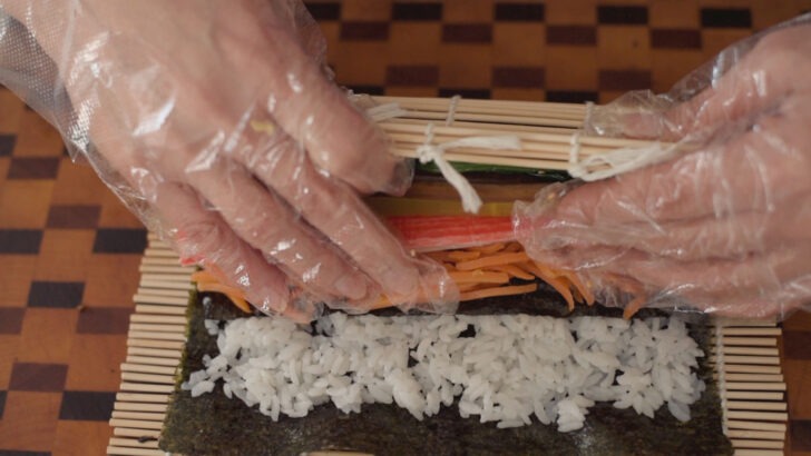 Bamboo sushi mat rolling kimbap.