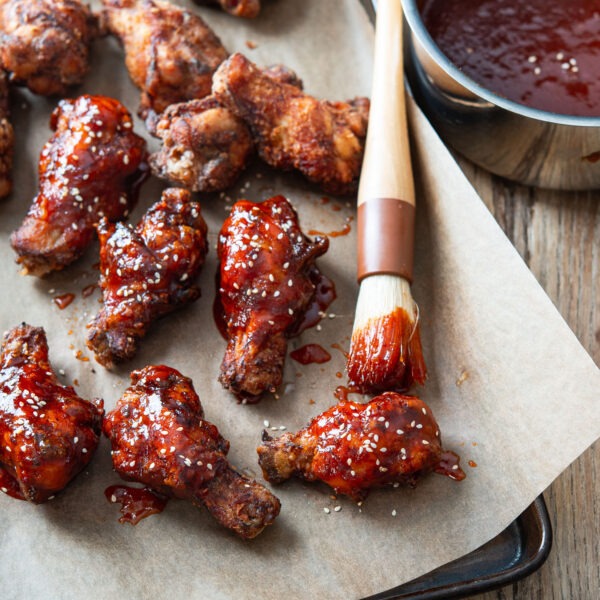 Gochujang sauce glaze brushed on crispy deep-fried wings.