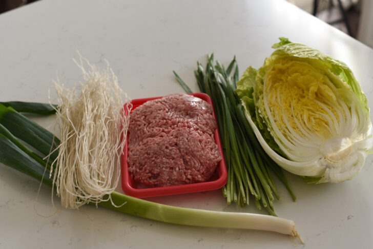 Ingredients for making Korean pork dumplings shown.