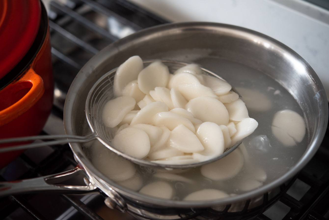 Rice cake rounds cooked in water.