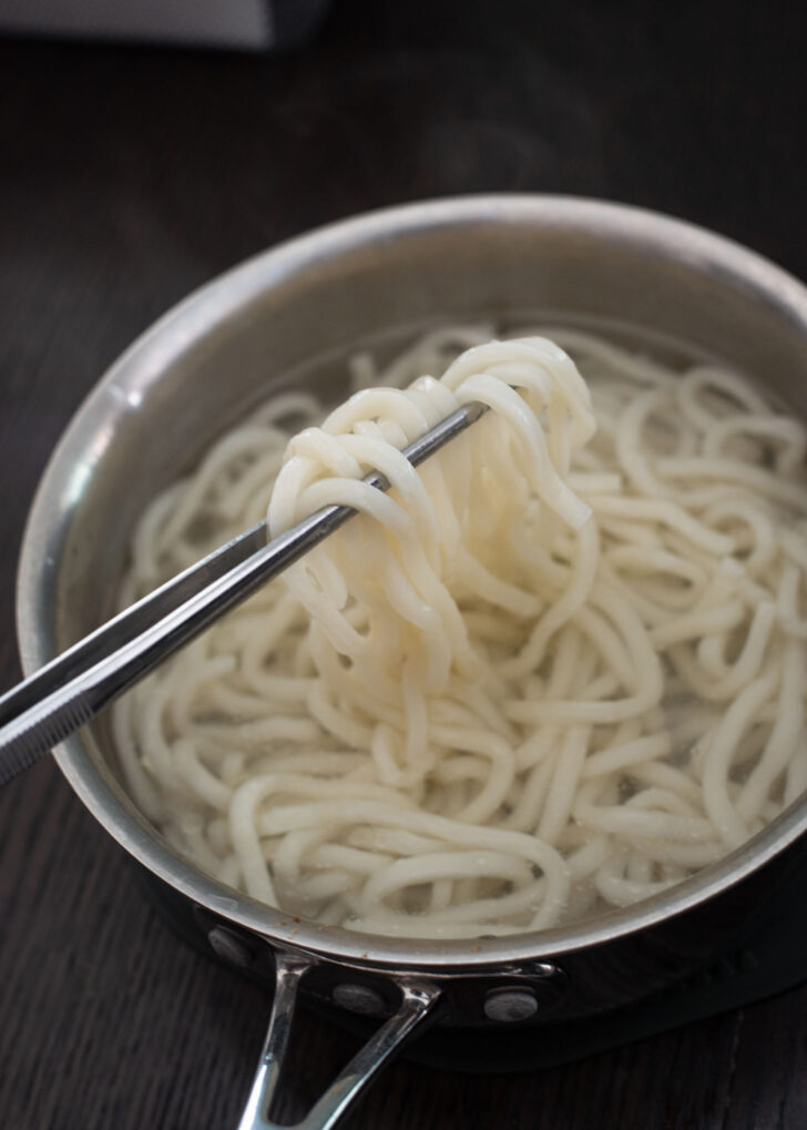 Softened udon noodles separated from each noodle strands.