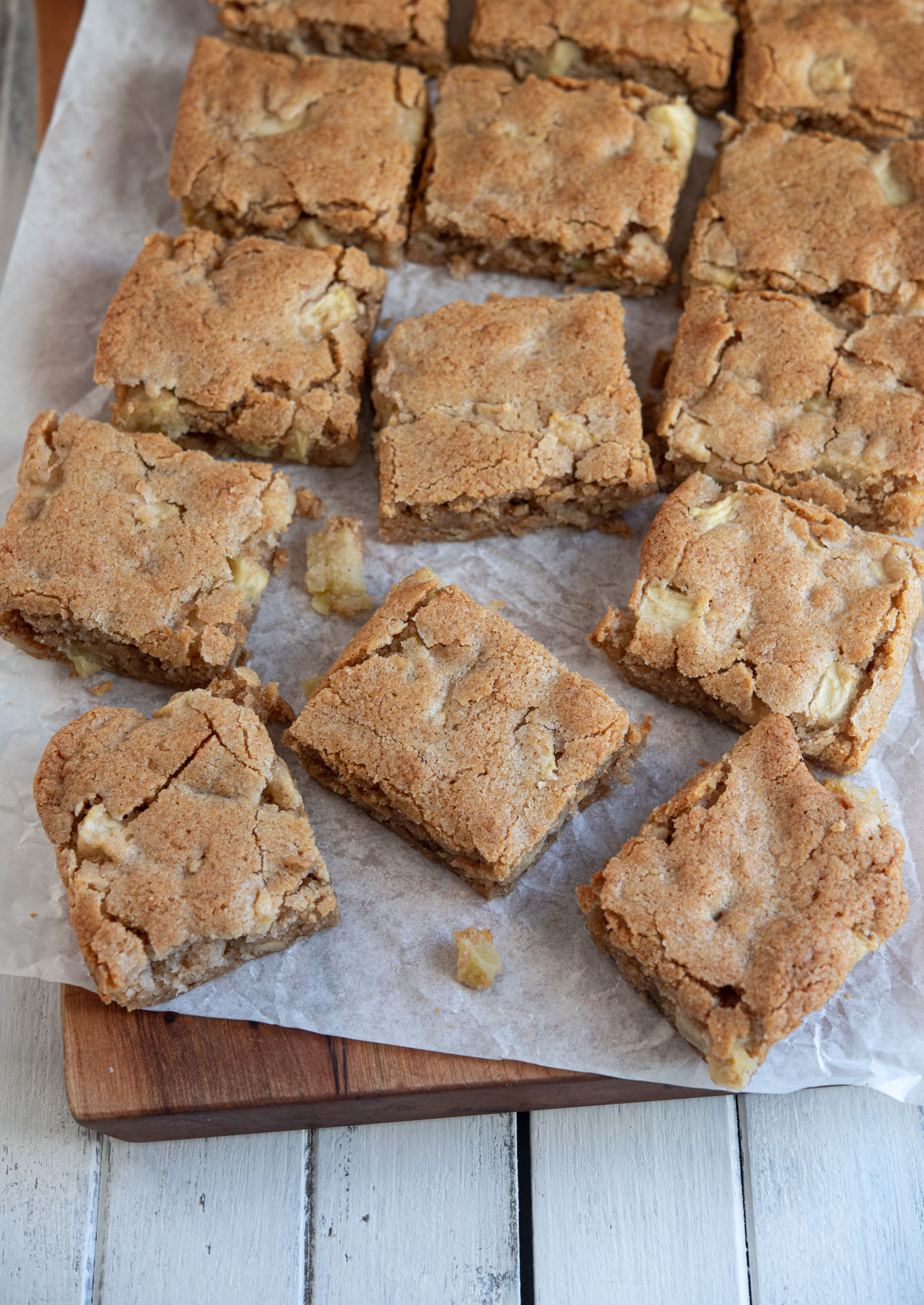 Apple brownies (apple blondies) sliced into squares.