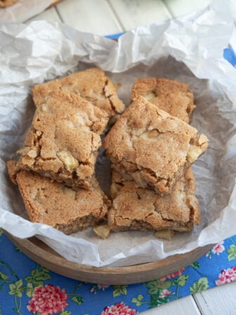 Apple brownie bars in a serving dish.