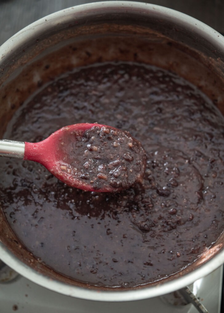 Thick sweet red bean soup in a pot.