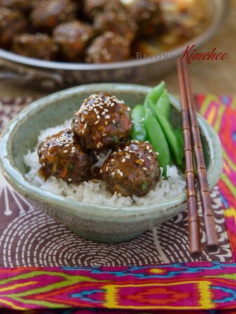 Pineapple Ssy glazed beef meatballs with rice and snow peas.