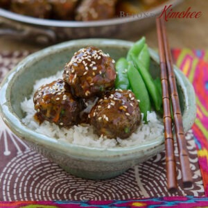 Pineapple Ssy glazed beef meatballs with rice and snow peas.