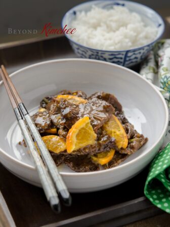 Korean style orange beef in a serving dish.