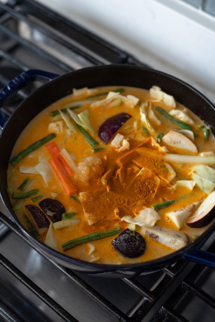 Vegetable curry with coconut milk with turmeric powder.