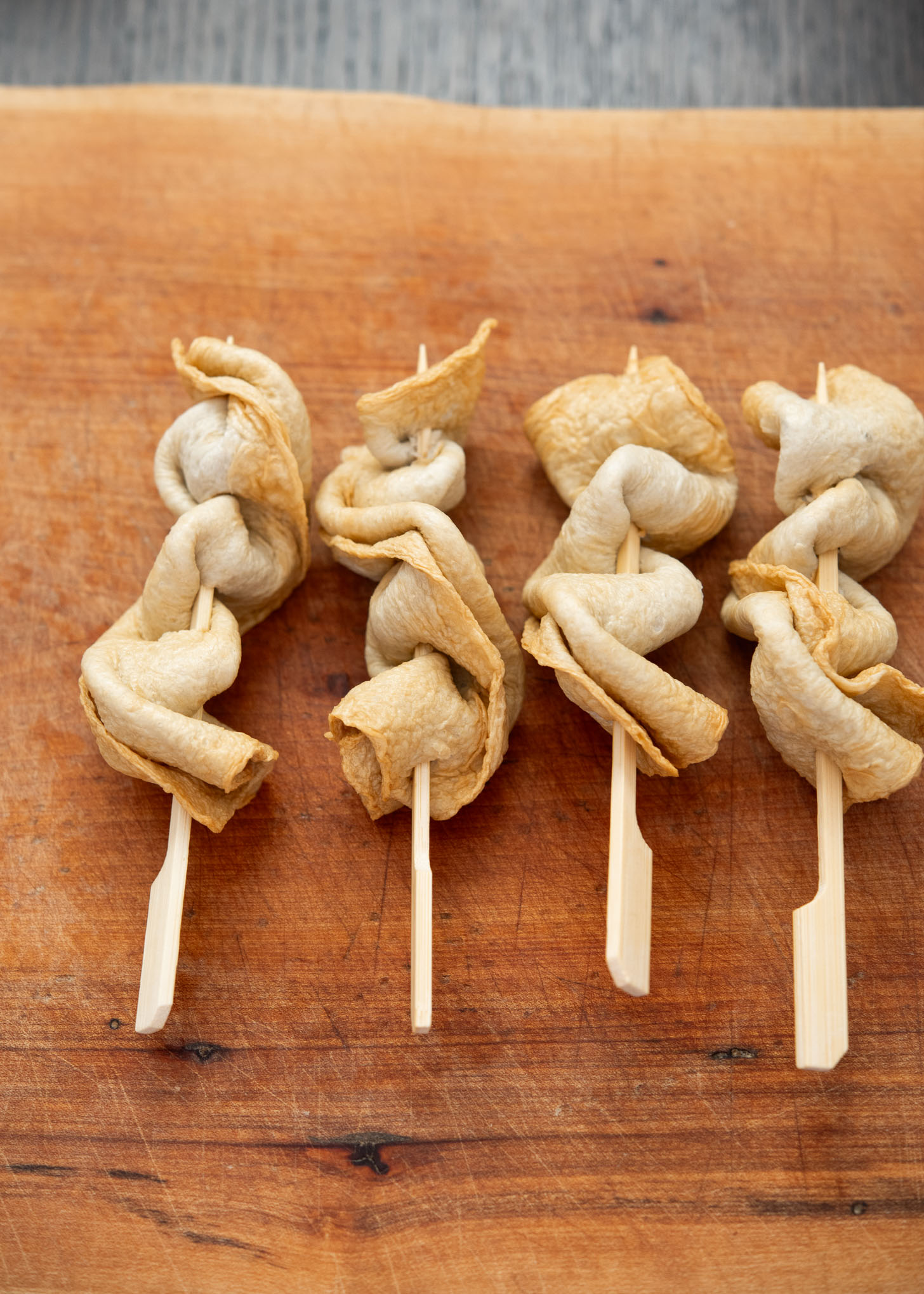 Fish cake skewers ready for Korean kimchi udon soup.