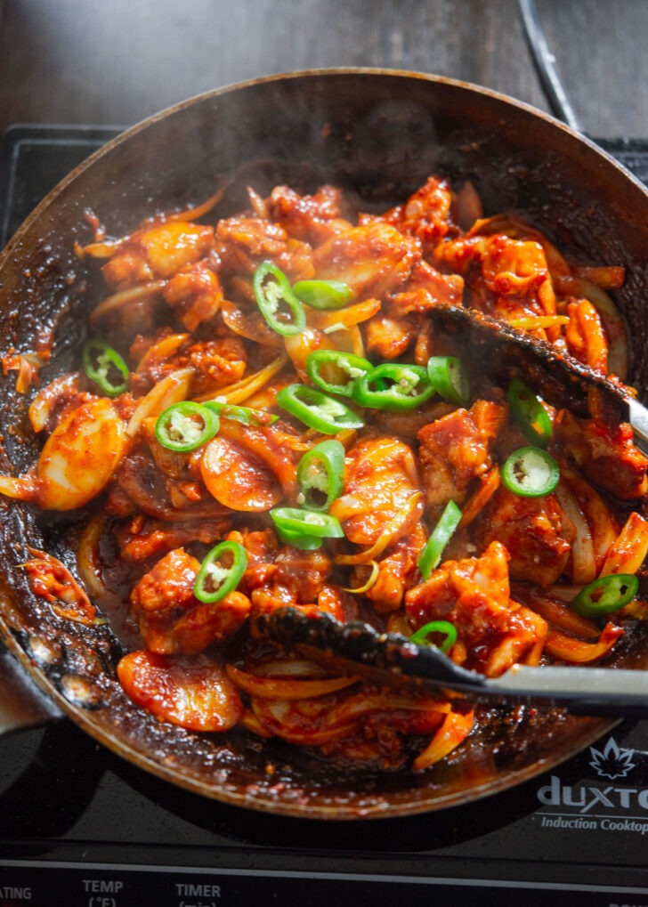 Buldak chicken stir fried with green chili.