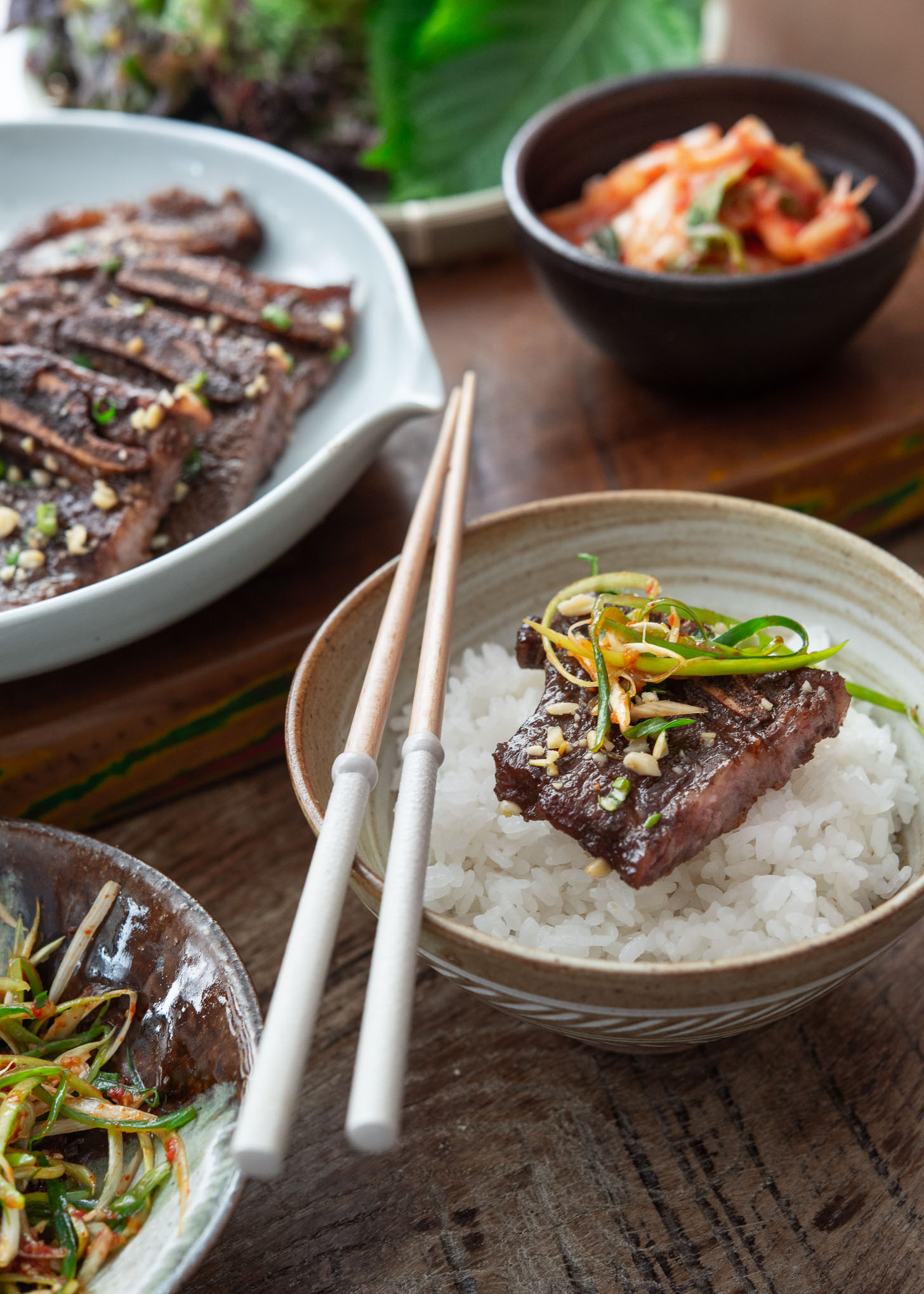 Korean beef short rib over a bowl or rice.