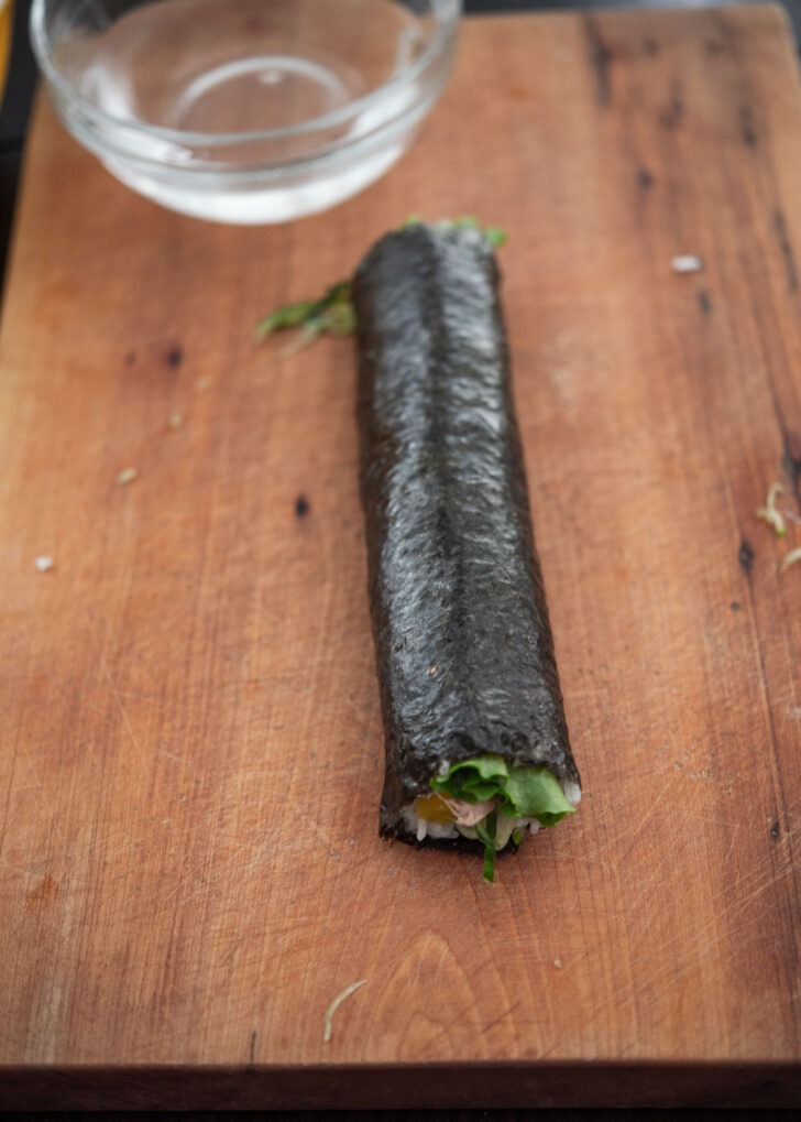 Tightly rolled cucumber tuna kimbap.