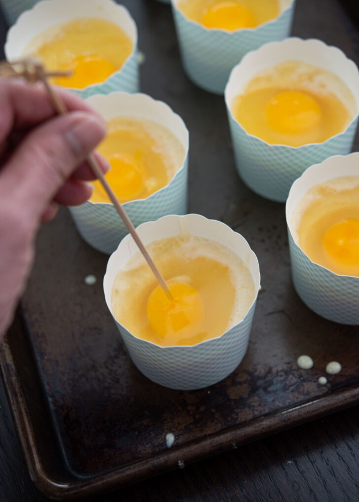 A toothpick inserted to egg yolks.