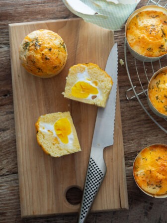 Korean egg bread sliced in half showing whole egg inside.