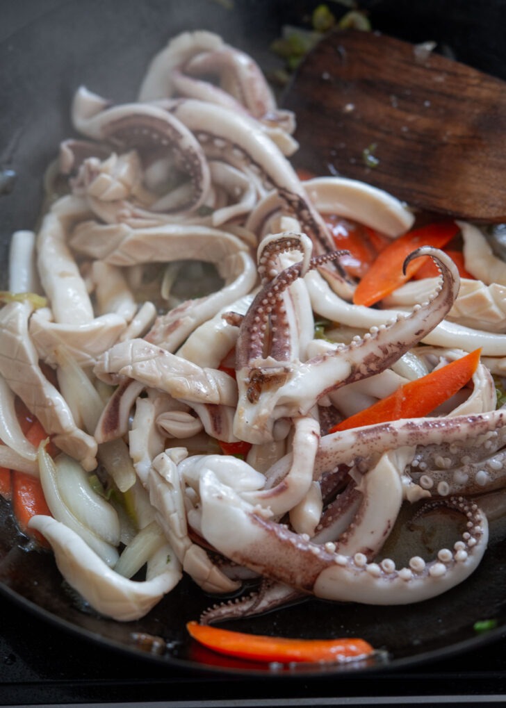 Squid pieces stir fried to barely cooked.