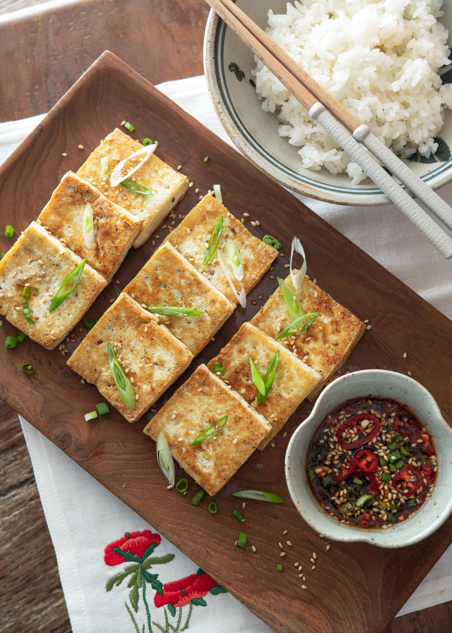 Korean style crispy pan-fried tofu with dipping sauce.