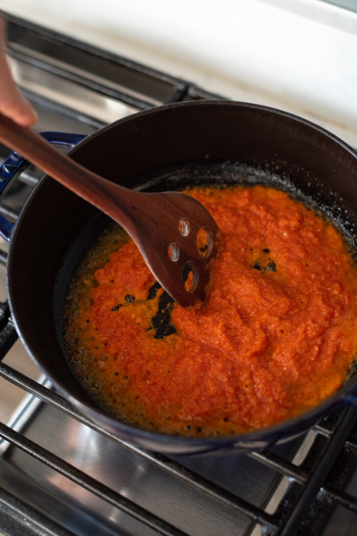 Chili paste mixture frying in a pan.