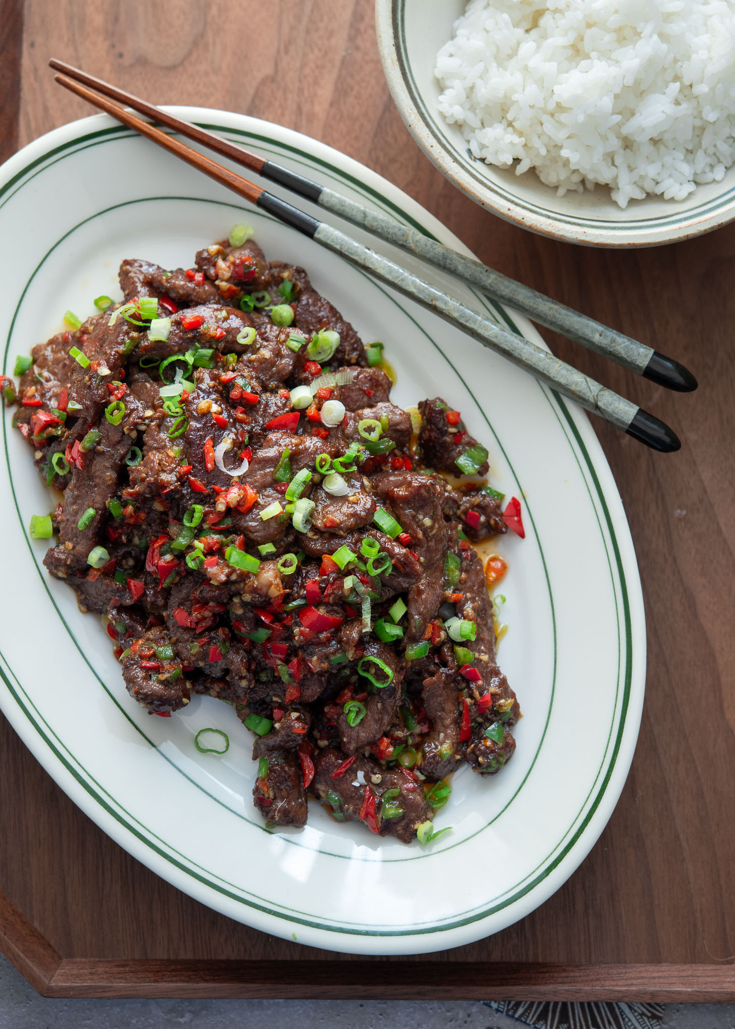 Cumin beef stir-fry served with rice.