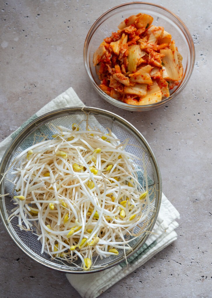 Soybean sprouts and chopped kimchi.