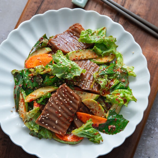 Acorn jelly salad (dotori muk) in a bowl.