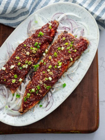 Pan fried spicy mackerel (gogalbi) served on a platter.