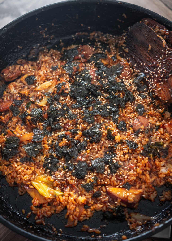Seaweed snack and sesame seeds added to dakgalbi fried rice.