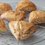 Lemonade scones cooling on a wired rack.
