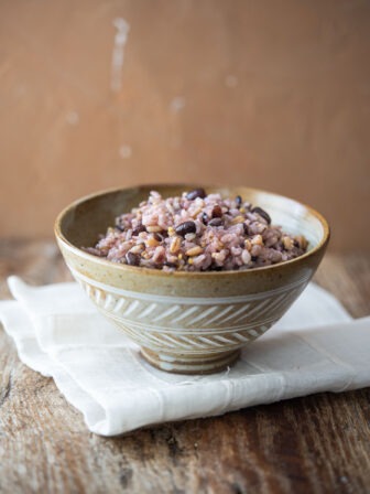 Bowl of Korean multigrain rice (japgokbap) made with 7 grains including white rice, millet, barley, black rice, and oats.
