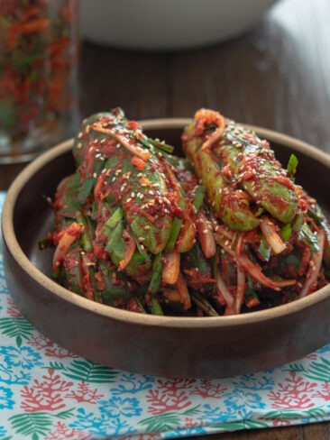 Stuffed cucumber kimchi (oi sobagi) made with cucumbers, garlic chives, and Korean chili flakes