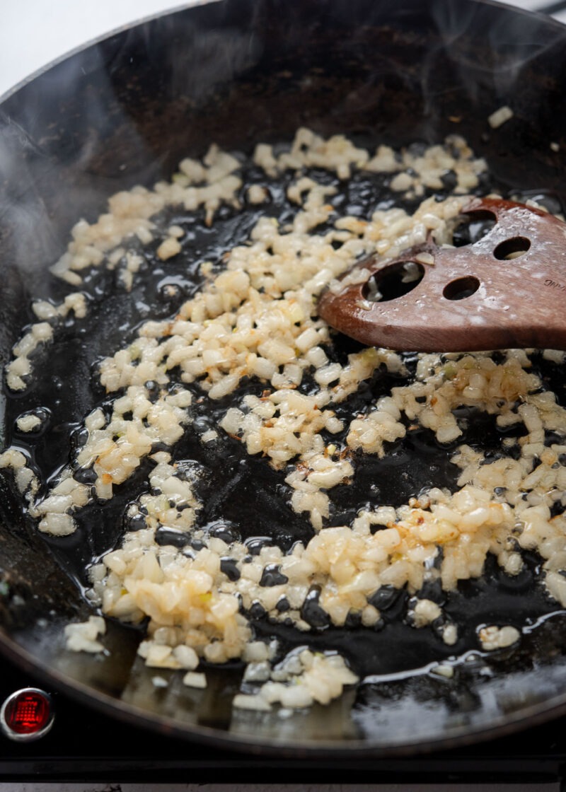 Browning chopped onion in butter for Korean donkatsu brown sauce