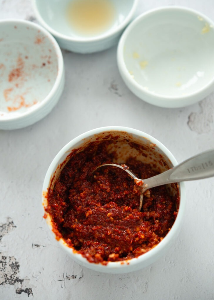 Pork rice soup topping sauce prepared in a bowl