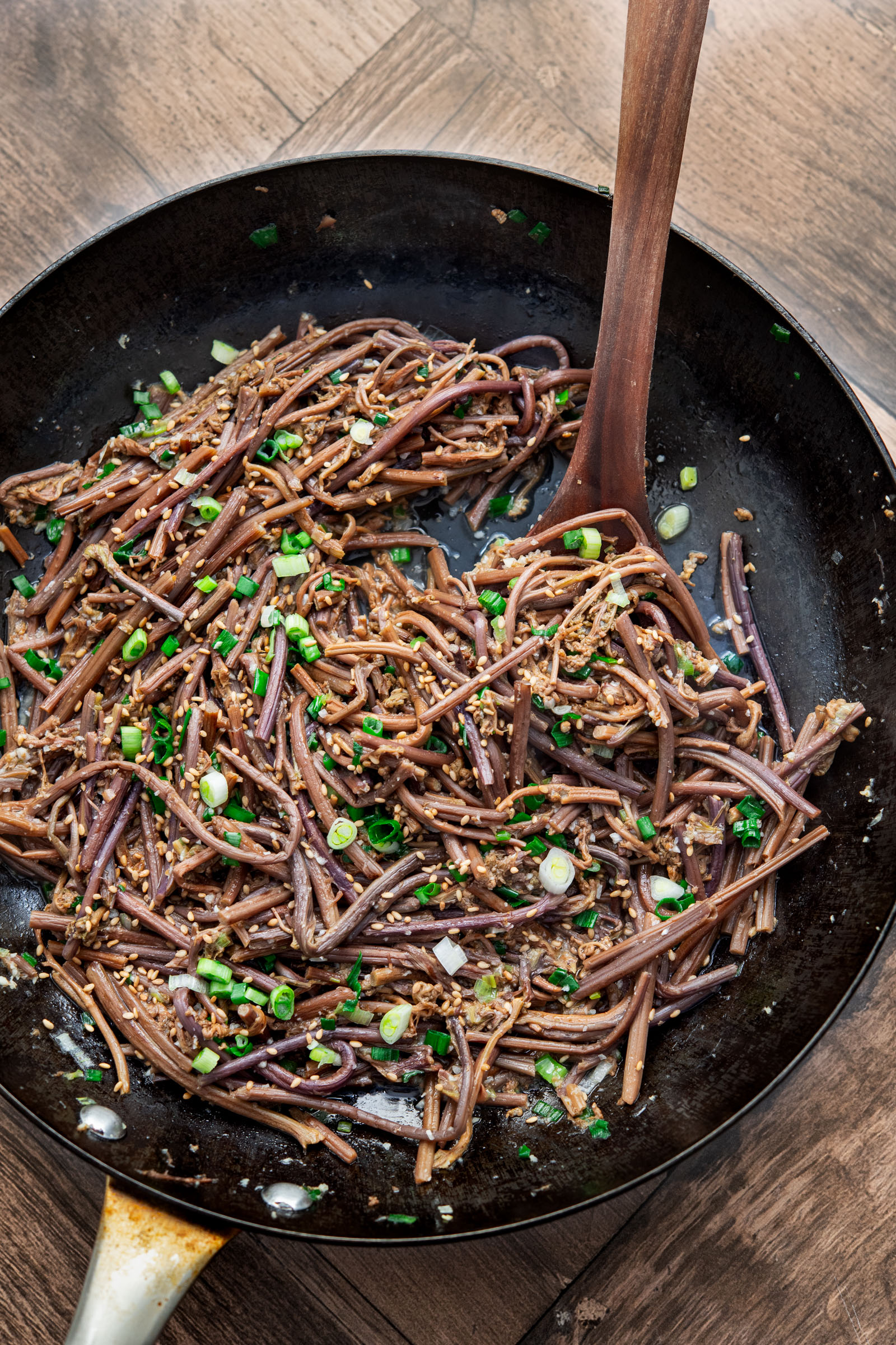 Tender and moist gosari namul (Korean fernbrake) cooked in a skillet