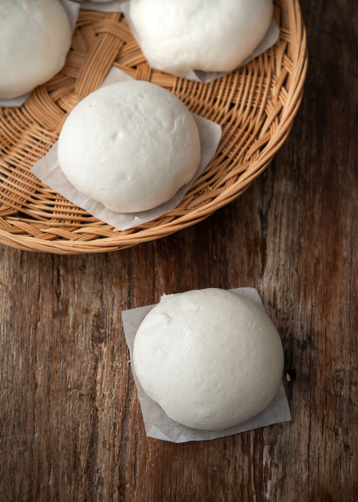 White, fluffy Korean steamed hoppang on a serving tray